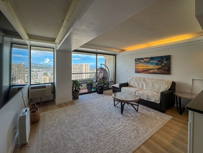 Building Photo - Available 03/01/2026. Fully-furnished, high-floor, mountain views, amenities!