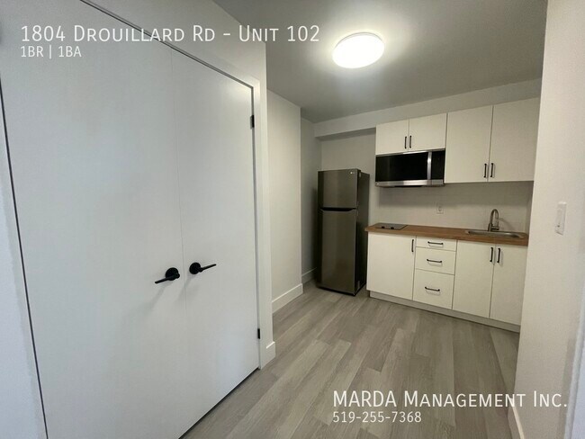 Photo du bâtiment - MODERN & COZY 1 BED/1BATH UNIT IN EAST WIN...