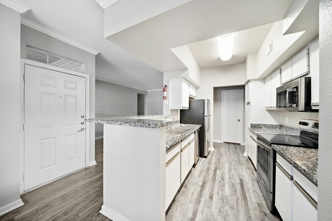 Building Photo - Modern, Pet-Friendly, and Priced Right!