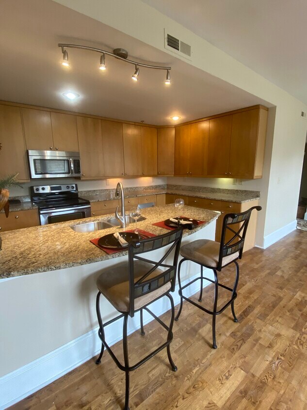 Granite. - 803 E 6th St