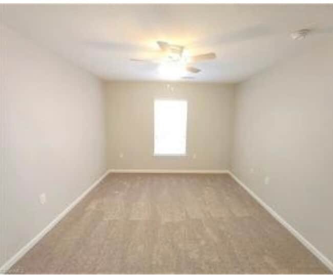 Bedroom with ceiling fan and nice natural light - 1885 Crest Hollow Dr