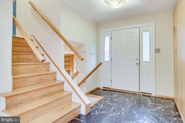 Photo - This elegant and unique three-level split ... House