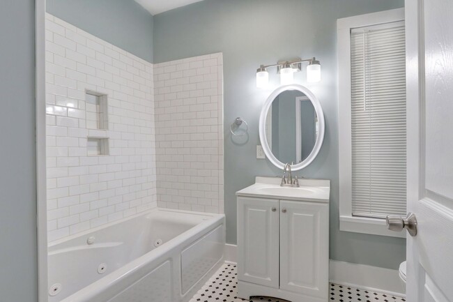 Building Photo - Completely Renovated - Three Bedroom, Two ...
