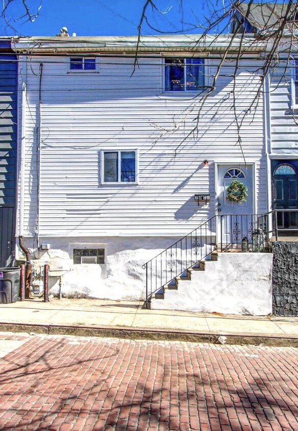 Tucked away on a quiet cobblestone street, this listing is the classic picturesque Philly home. - 2625 E Seltzer St