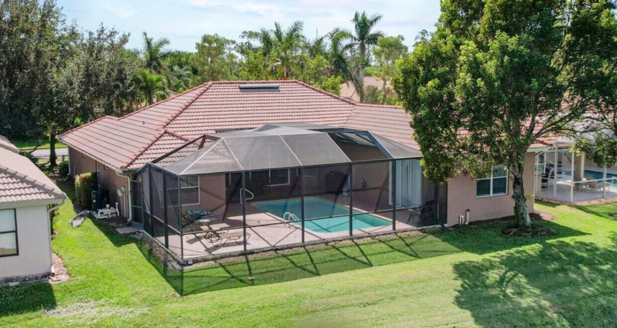 Building Photo - ** ANNUAL ** 4 BEDROOM-2 BATH SINGLE FAMIL...