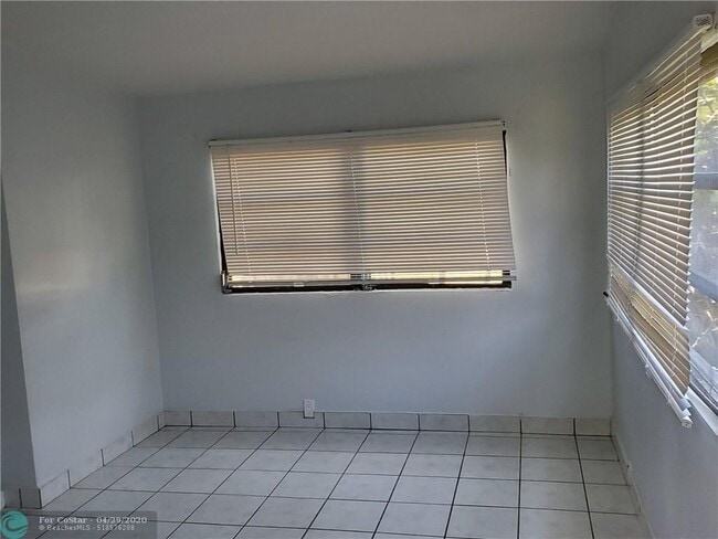 Building Photo - 1881 NE 49th Ct