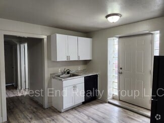 Building Photo - 105 S Harriet Ave