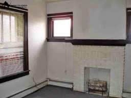 Spacious living room with fireplace - 11 3rd Ave