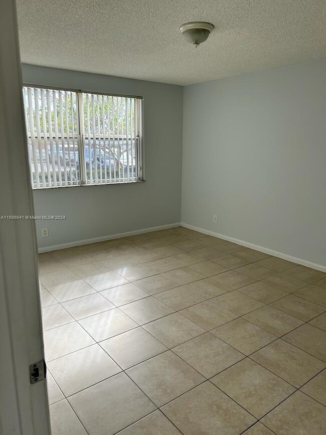 Building Photo - 8977 Wiles Rd