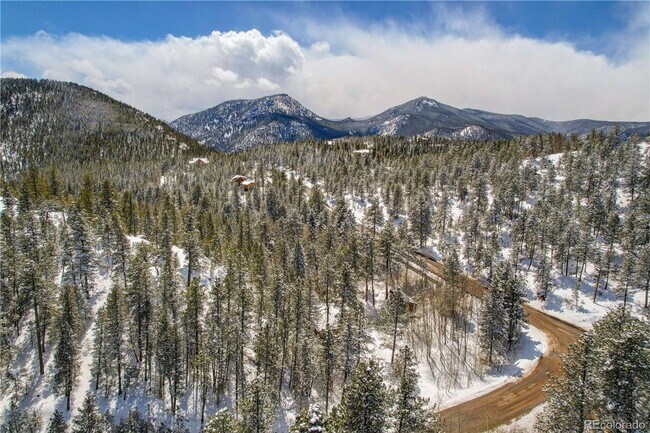 Foto del edificio - GORGEOUS HOME IN COAL CREEK CANYON ON 4.85 ACRES! RENT, BUY, OR RENT TO OWN!
