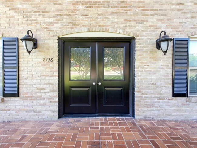 The front door of the building - 7718 Royal Ln