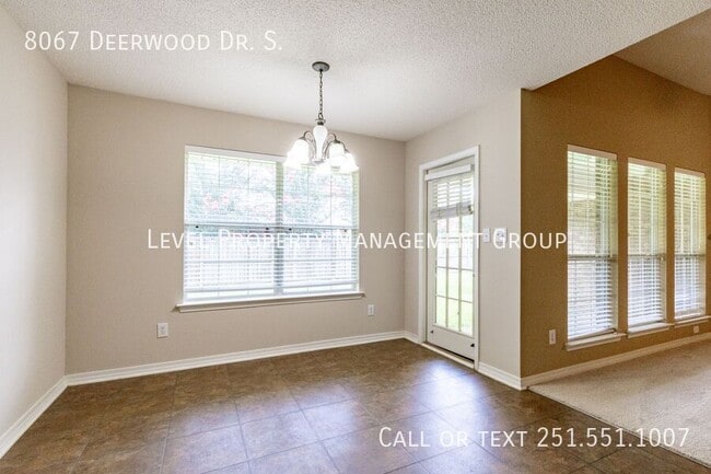 Building Photo - 8067 Deerwood Dr