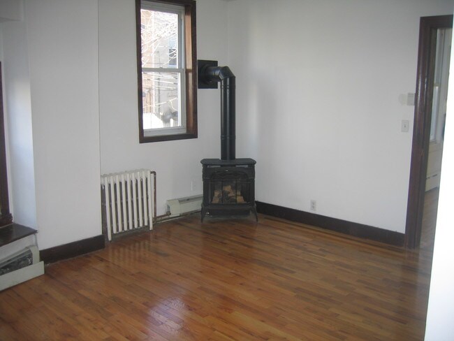 bed with fireplace - 16 46th St