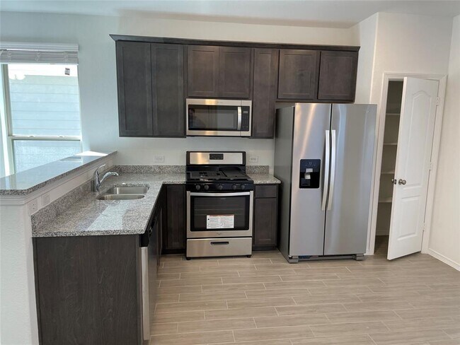 Building Photo - 25536 Northpark Palm Dr