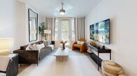 Located at 4115 Lake St in the heart of Alpharetta, GA, this well-appointed one-bedroom, one-bathroom residence offers a thoughtfully designed single-level layout with modern finishes throughout. Light wood flooring flows seamlessly across the entire space, creating a warm and cohesive aesthetic.

The open-concept kitchen and living area serves as the heart of the home. The kitchen is equipped with grey shaker-style cabinetry extending to the ceiling, white quartz countertops, a classic subway tile backsplash, and a full suite of stainless steel appliances including a French door refrigerator and gas range. A kitchen island with an undermount sink adds both functionality and counter space.

The living room is bright and inviting, featuring a ceiling fan, striped drapery panels, and a glass-paned door that opens to an outdoor area with views of the surrounding neighborhood. Natural light fills the room, enhancing its open and airy feel.

The bedroom is a comfortable retreat with a dedicated walk-in closet offering ample storage with built-in hanging rods. The bathroom mirrors the kitchen's design language, showcasing grey shaker vanity cabinetry, a white quartz countertop, a large mirror, and a tiled soaking tub/shower combination with wood-look flooring completing the clean, contemporary aesthetic.