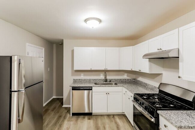 Building Photo - Now available 4 bedrooms 2 baths