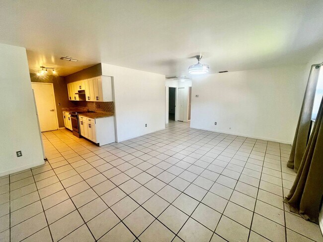 Building Photo - Charming 3-Bedroom Duplex with Lawn Care I...