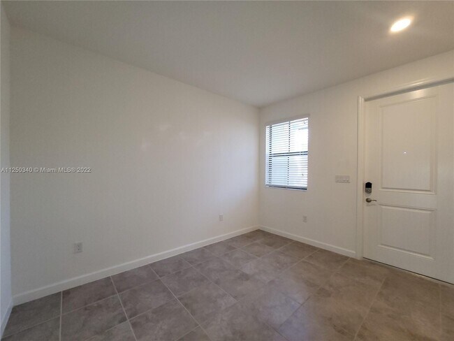 Building Photo - 25039 SW 114th Ave