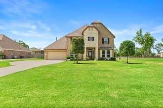 Building Photo - 9502 Windsong Dr