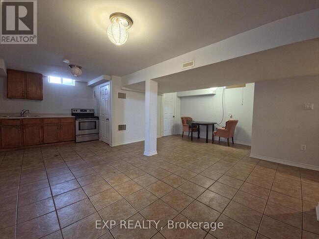 Building Photo - 5815 Riverdale Crescent