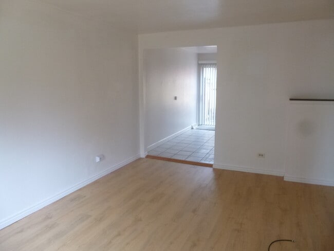 LIVING ROOM TOWARDS KITCHEN - 720 Miller Ct Townhome