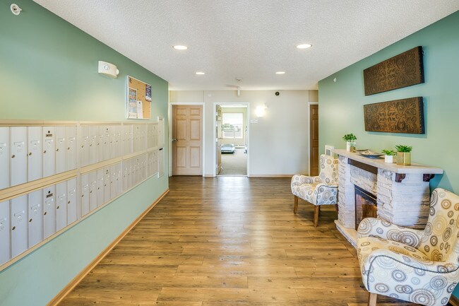 Indoor Mailboxes and Fireplace - Boulder Ridge Apartment Homes