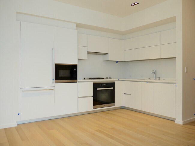 Armarios Pedini y electrodomésticos Miele - 1075 NW Northrup