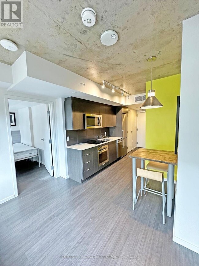 Photo du bâtiment - 105-1105 Champagne Ave S