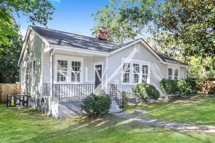 Primary Photo - The living is easy in this 3 bedroom, 1 ba...