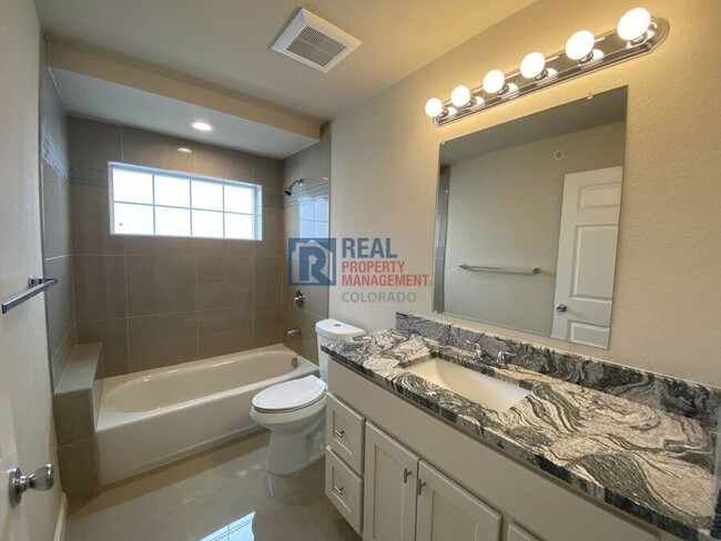 Building Photo - 875 E 78th Ave