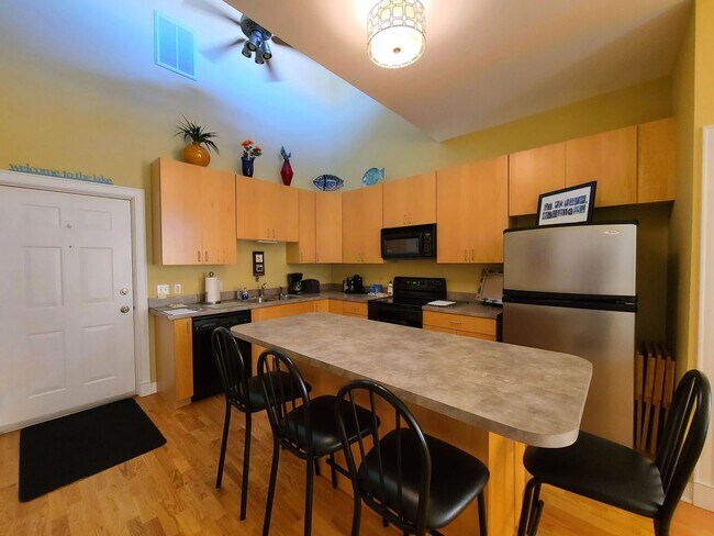Foto del edificio - Fully Furnished Executive Condo in Downtow...