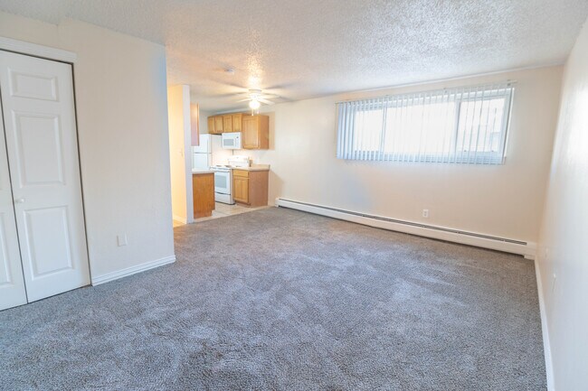 Sala de estar/comedor - Villas at Gage Point Apartments