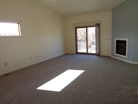Living room w/FP and walkout to deck - 2822 N Cascade Ave