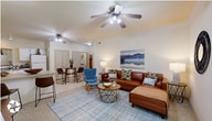 Located in Yukon, Oklahoma, this single-story, 3-bedroom, 1-bathroom home offers a well-organized layout that maximizes every square foot of its compact footprint. The open-concept living and dining area serves as the heart of the home, featuring ceiling fans, light-toned walls, and a bright window that invites natural light and outdoor views. The space comfortably accommodates both a seating arrangement and a dining table, creating a versatile and welcoming environment.

The kitchen is efficiently designed with white cabinetry, ample counter space, tile flooring, and a full suite of appliances including a range, microwave, refrigerator, and sink. A breakfast bar with seating connects the kitchen to the living area, enhancing the open flow of the space.

Each of the three bedrooms is finished with soft carpeting and ceiling fans, offering a comfortable retreat. The primary bedroom provides a generous layout with access to a closet. The single full bathroom features tile flooring, a tub-shower combination with sliding glass doors, and overhead cabinetry for storage.

A hallway connects the bedrooms and bathroom, keeping the floor plan organized and functional. Throughout the home, the neutral color palette and consistent finishes create a cohesive, understated aesthetic.