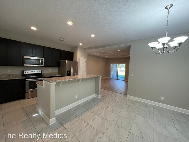 Foto del edificio - 3 br, 2.5 bath House - 8452 Magnificent Lane