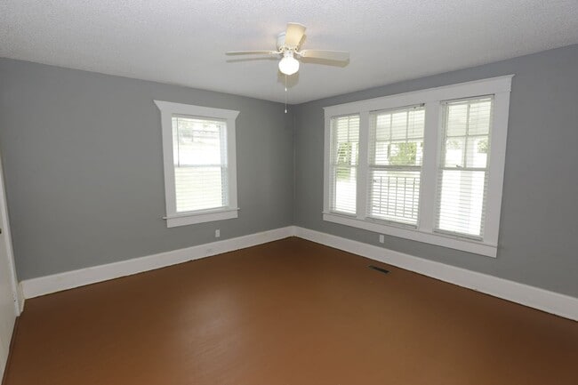 Building Photo - Spacious 4-Bedroom Home with Modern Upgrad...