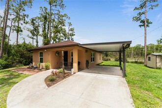 Building Photo - 3241 Tropicaire Blvd