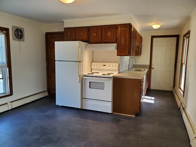484 Main St, Apt 201, kitchen with very handsome vinyl flooring that looks like slate. - 484 Main St