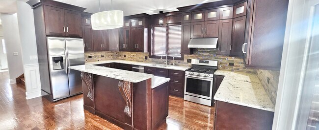 Building Photo - 7130 W Highland Ave