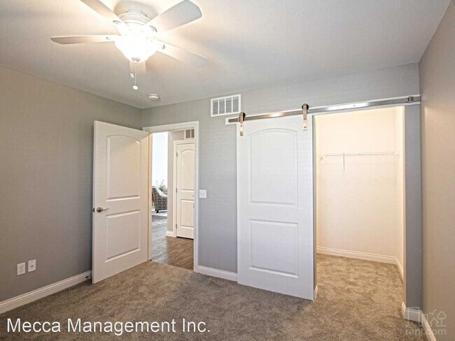 Building Photo - 7128-7128 Triumph Ln