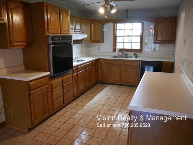 Building Photo - 5570 Cave Springs Rd