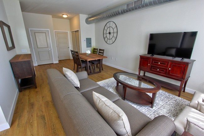 A spacious living area at Draper Loft - Draper Lofts Apartments