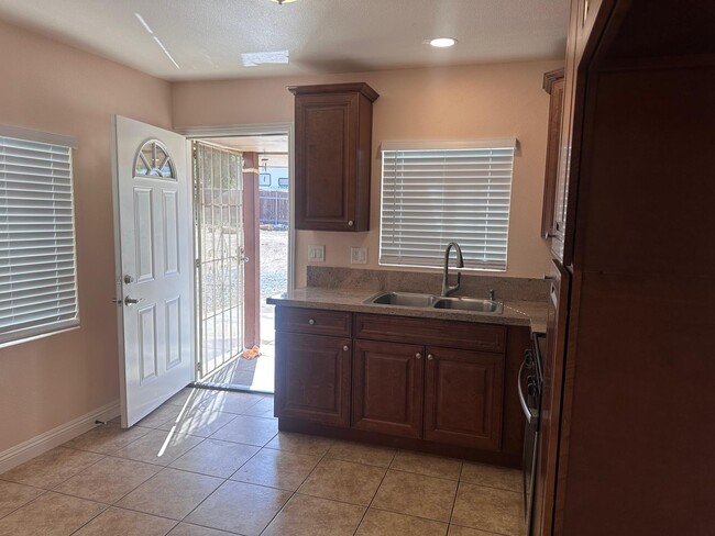 Kitchen with new cabinets and countertop - 1654 E Ontario Ave