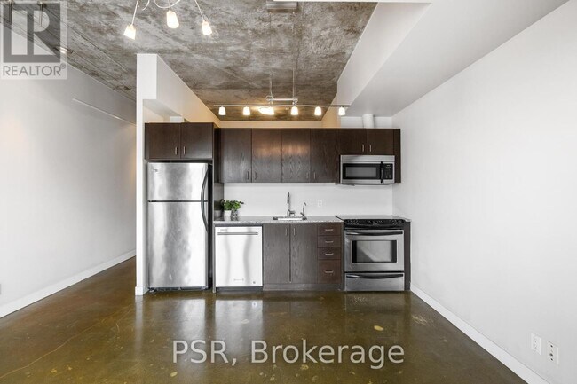 Photo du bâtiment - 201-201 Carlaw Ave