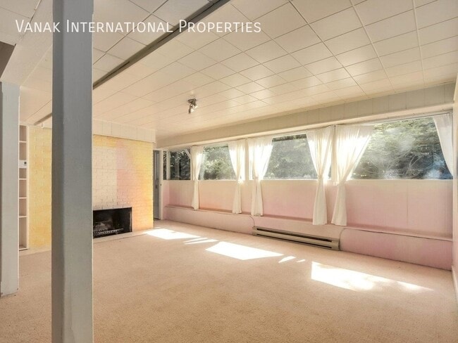 Building Photo - Prime Lynn Valley Corner Property, Ideal for Daycare/Group Childcare