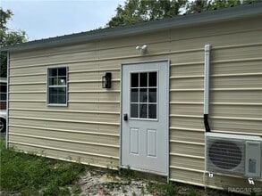 Building Photo - 6345 W Mango Ln