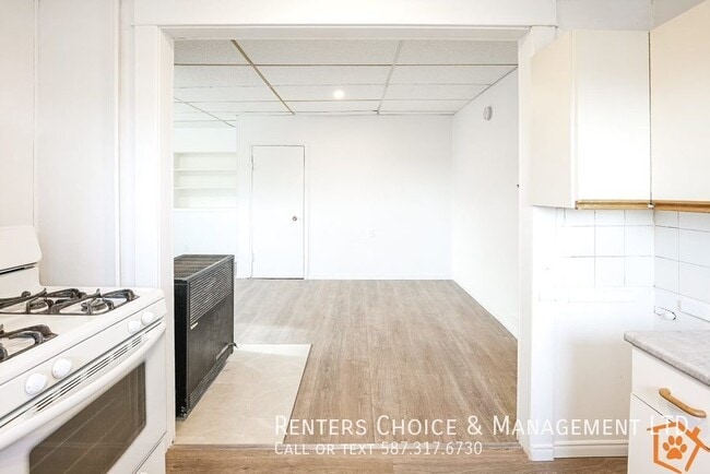 Building Photo - Cat-Friendly Downtown Taber Apartment with Laundry Access