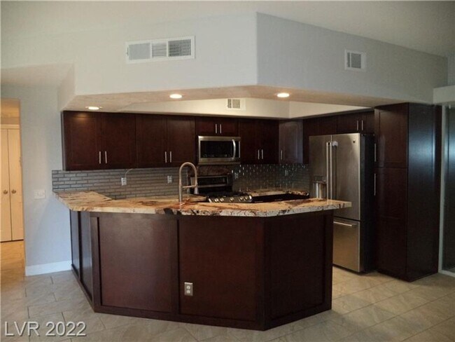 Building Photo - BEAUTIFUL FIRST FLOOR CONDO IN GATED COMMU...