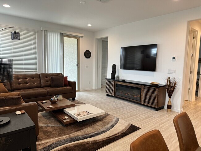View of fireplace and smart tv - 9052 W Georgia Ave