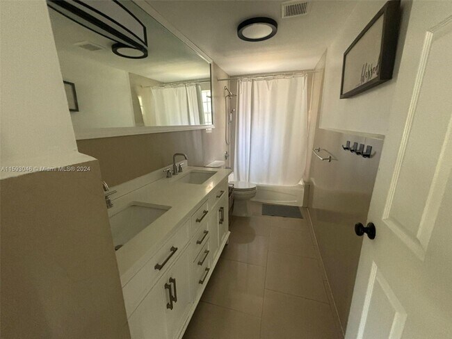 Building Photo - 6966 Byron Ave